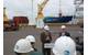 First handful of cooling units being offloaded during today’s media briefing at the Duluth Seaway Port Authority’s Clure Public Marine Terminal with Dave McMillan (L), senior vice president of external affairs at ALLETE and executive vice president of Minnesota Power, along with Vanta E. Coda II (R), executive director of the Duluth Seaway Port Authority speaking in the foreground.