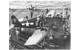 Flight Deck Crew Swarm Over an F6F Hellcat - July 1944. (Photo: U.S. Navy’s National Museum of Naval Aviation, Pensacola, Fla.)