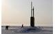 Los Angeles-class fast attack submarine USS Alexandria (SSN 757) is submerged after surfacing through two feet of drifting ice about 180 nautical miles off the north coast of Alaska. U.S. Navy photo by Shawn P. Eklund