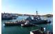 USS John S. McCain is towed to a pier at Fleet Activities (FLEACT) Yokosuka. (U. S. Navy photo by Leonard Adams Jr.)