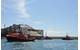 Messico towing the Costa Concordia wreck with Norvegia at far right