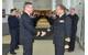 Outgoing DCOM Rear Admiral Martens shakes hands with incoming DCOM Rear Admiral Bauzá as the Operational HQ staff applaud (Photo courtesy EU NAVFOR)