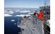 Ship’s Serviceman Seaman Recruit Jamal Powell, left, and Seaman Recruit Stephen Harmon stand forward lookout watch aboard guided-missile cruiser USS Normandy (CG 60) as the ship navigates an ice field north of Iceland. U.S. Navy photo by Ryan Birkelbach