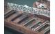 Taconite falls into the motor vessel Philip R. Clarke off the conveyor belt from the motor vessel Roger Blough (U.S. Coast Guard photo by Ryan Tig Hogan)