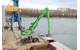 Thanks to the 870, ships arriving in Germersheim laden with up to 2,000 tons of gravel can be completely emptied in just two hours. Image Credit: Sennebogen
