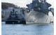 USS John S. McCain is towed to a pier at Fleet Activities (FLEACT) Yokosuka. (U. S. Navy photo by William McCann)