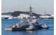 USS John S. McCain is towed to a pier at Fleet Activities (FLEACT) Yokosuka. (U. S. Navy photo by Leonard Adams Jr.)