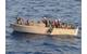 Visit, board, search and seizure team members pull suspected pirates from the sea to be brought to the amphibious dock landing ship USS Ashland. (U.S. Navy photo/ Jason R. Zalasky)
